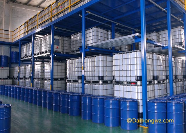 Damongwz warehouse stocked with blue steel drums and white IBC totes of W201 linear dimethicone silicone fluid.